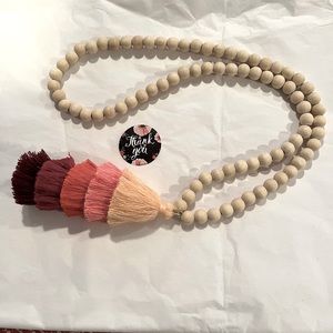 Wooden bead and tassel 21” necklace. Excellent condition.